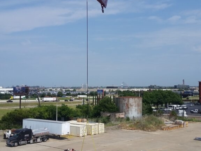 photo of Helicopter Bringing In Reroof Materials